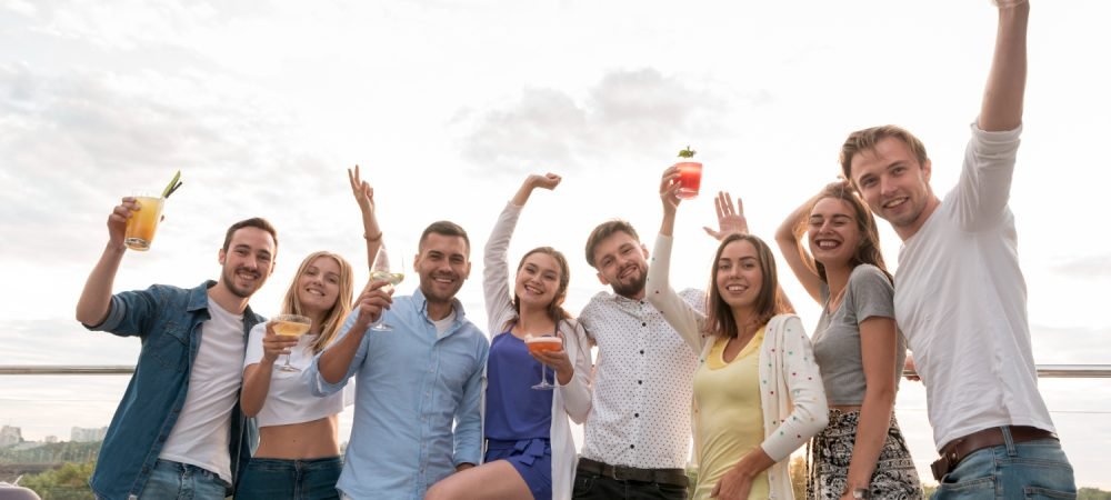 friends-posing-with-drinks-party